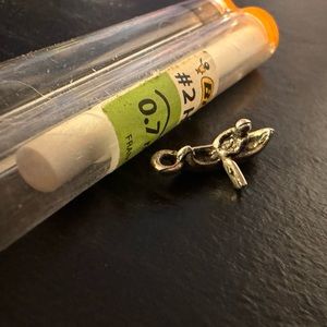 Person canoeing pendant